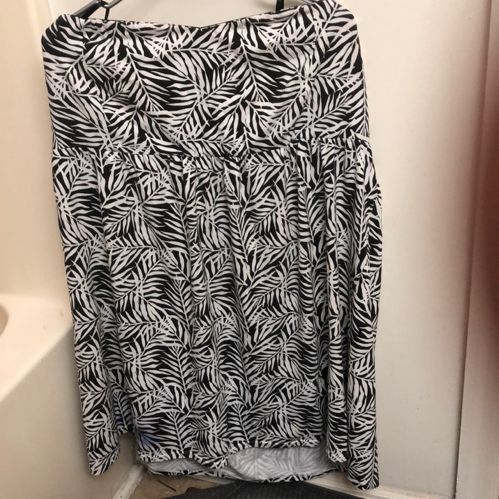 Strapless dress..I used it as a coverup often!